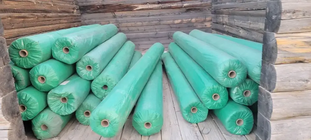 Stack of new turf rolls ready for delivery